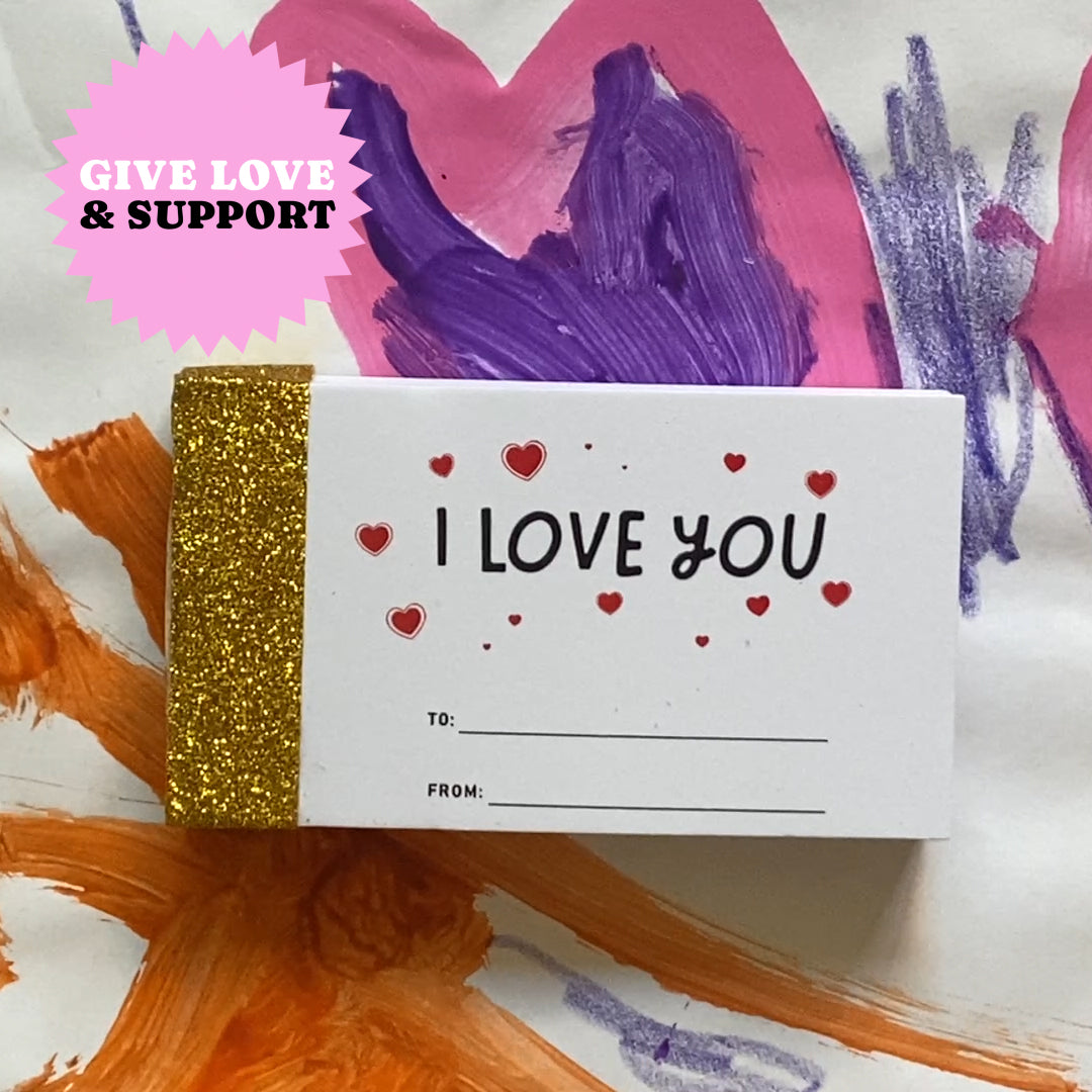Card with 'I Love You' text on a colorful kids painting background with 'Give Love & Support' sticker.